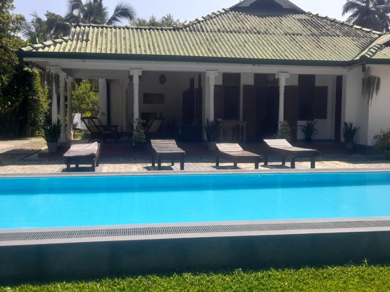 היקדואה Tranquility Guest House מראה חיצוני תמונה